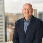 John Blizzard, CEO of CD Valet, smiles at the camera.