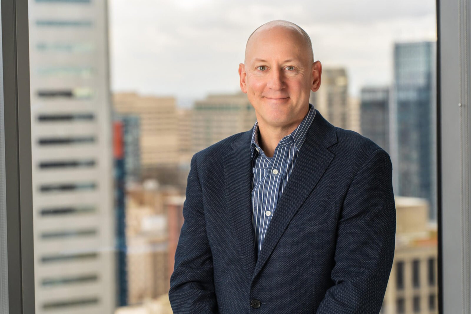 John Blizzard, CEO of CD Valet, smiles at the camera.