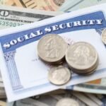 social security card with change on top